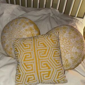 Set of 3 decorative throw pillows in warm yellow tone